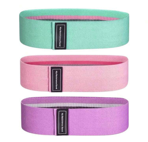 fabric resistance bands set in three colors: green, pink, and purple for effective workouts and resistance training.